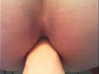 tightcdass fucks wall mounted dildo