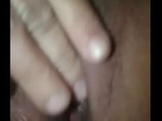 curly haired shemale on black latex dominating her slave