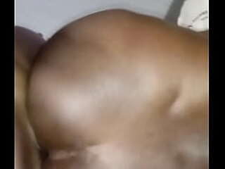 petite ladyboy in colorful dress gets her small cock sucked by a dude in bed