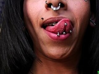 big tittied tranny with mouthful of piercings