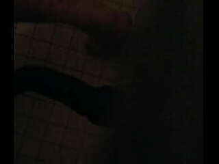 sexy ebony shemale with black cock strikingly stroking it