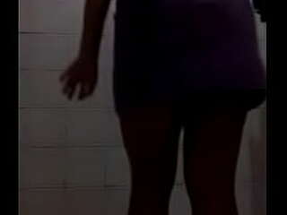 seductive asian ladyboy strips naked and strokes her shecock