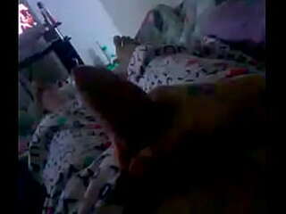 latex babe jerks off alone