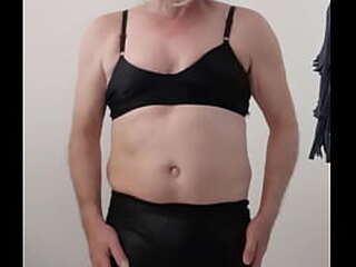 sissy crossdresser wearing sexy leather pants